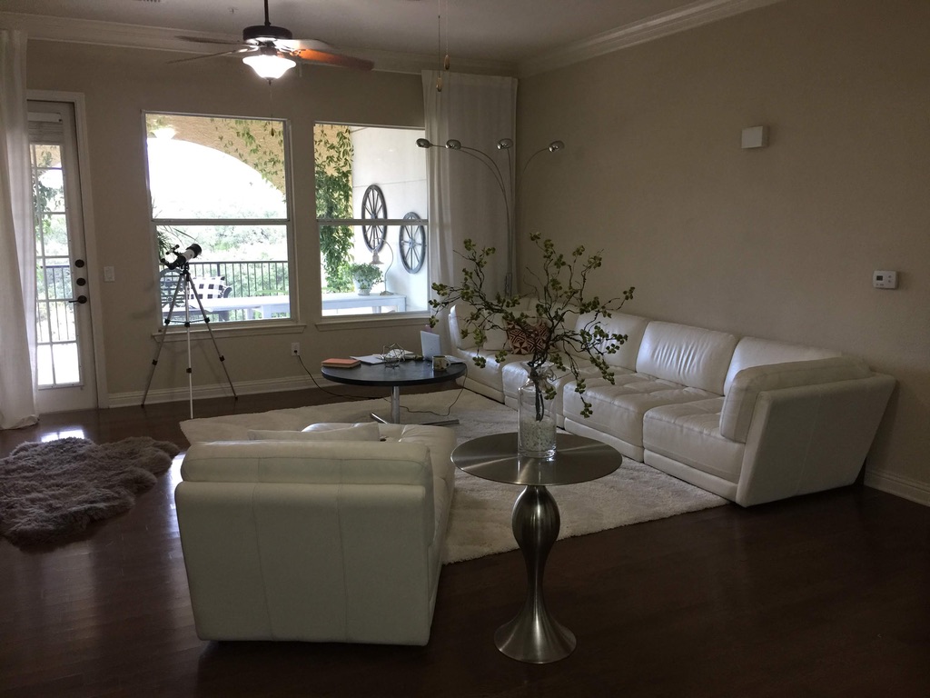 Warm corner detail with structured branch arrangement and ambient lighting