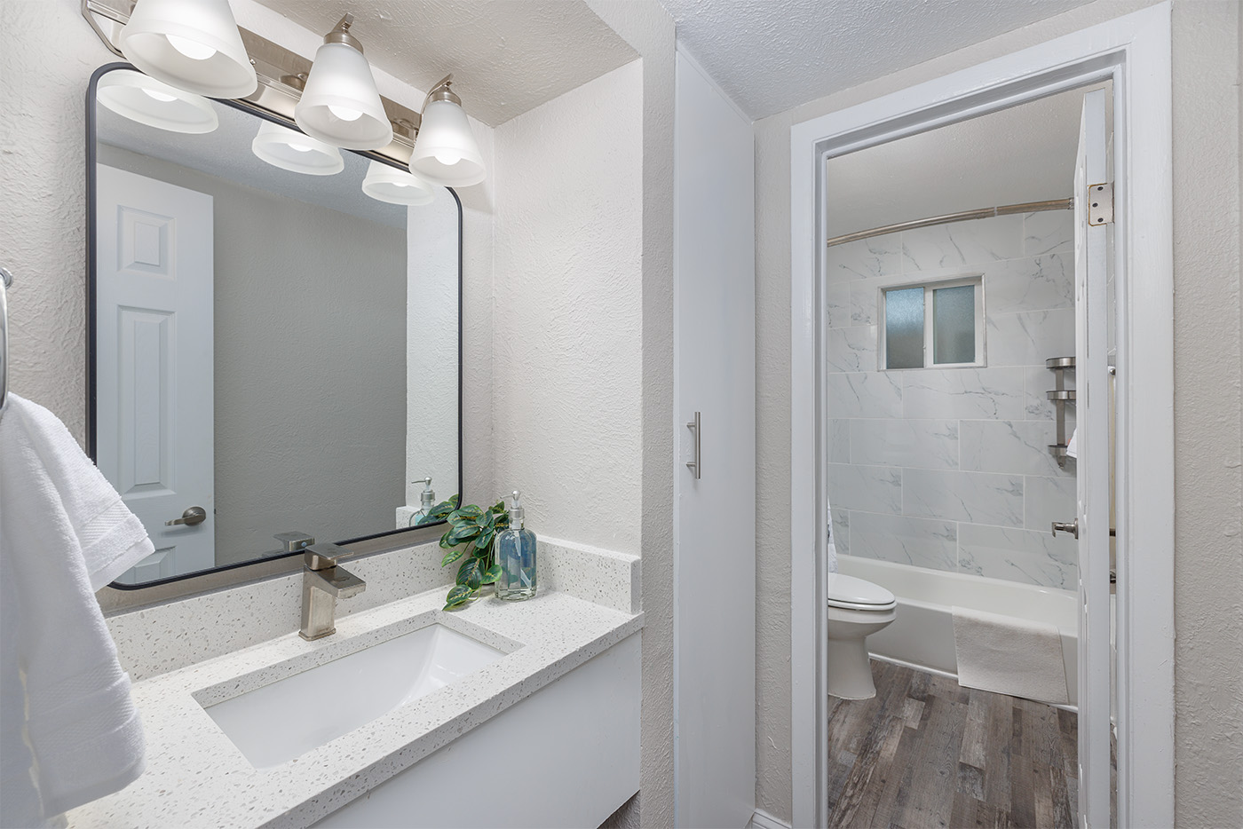 Cedar Springs bathroom with clean, warm finishes