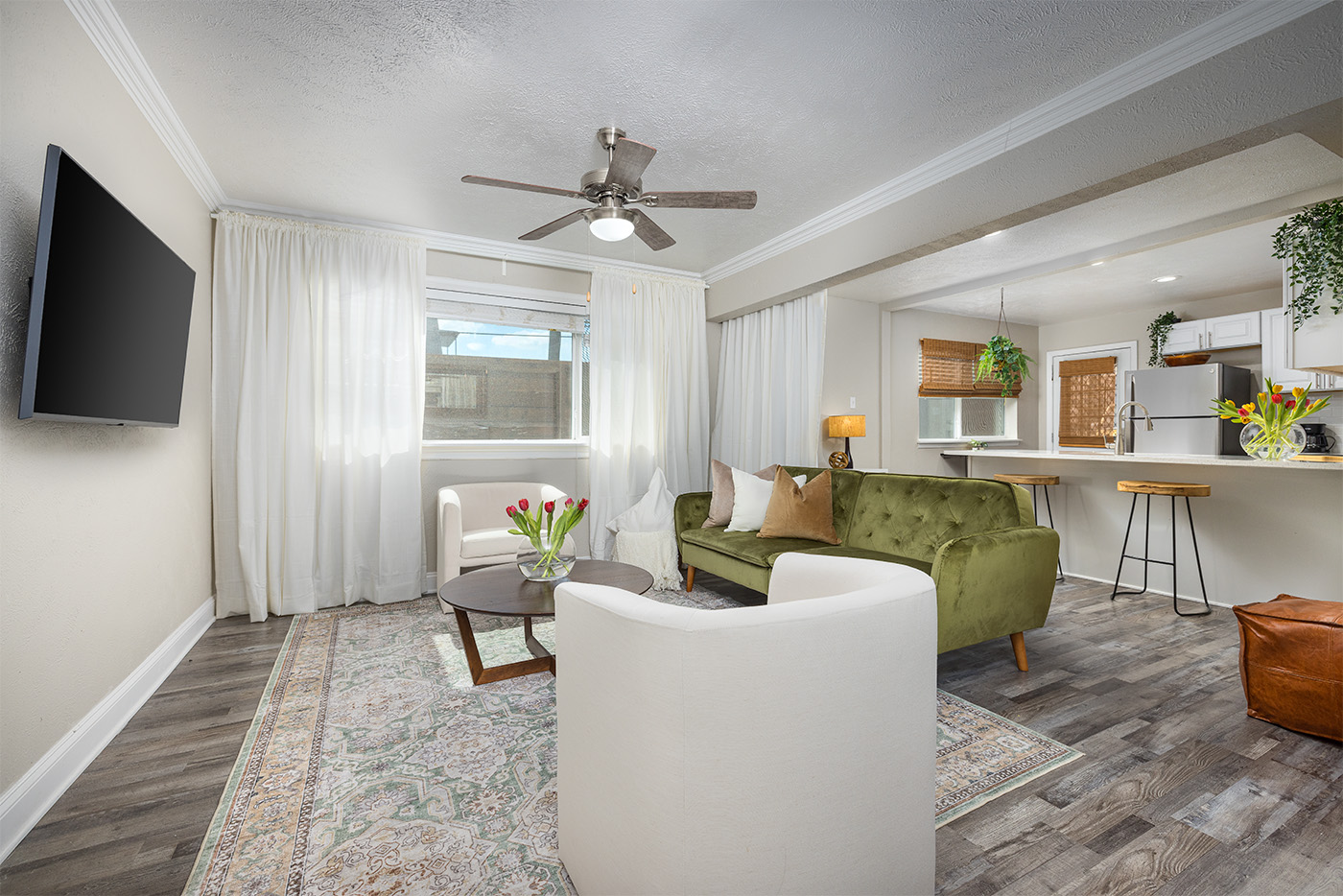 Cedar Springs living room: light-filled space with warm furnishings
